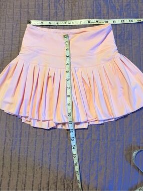 Pink Pleated Skirt with built in shorts with pockets on both sides of shorts